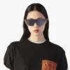 Lunettes de soleil à monture en forme de bouclier avec motif Monogram