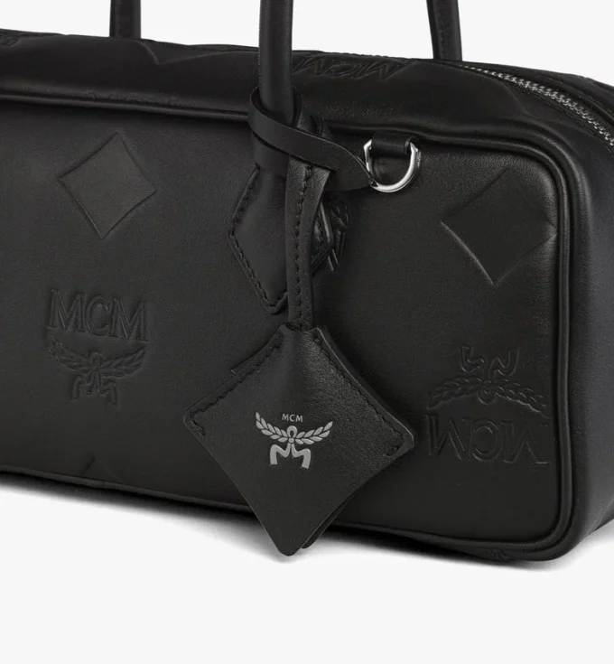 Sac à bandoulière Aren East West en cuir Maxi Monogram Sac à bandoulière Aren East West en cuir Maxi Monogram