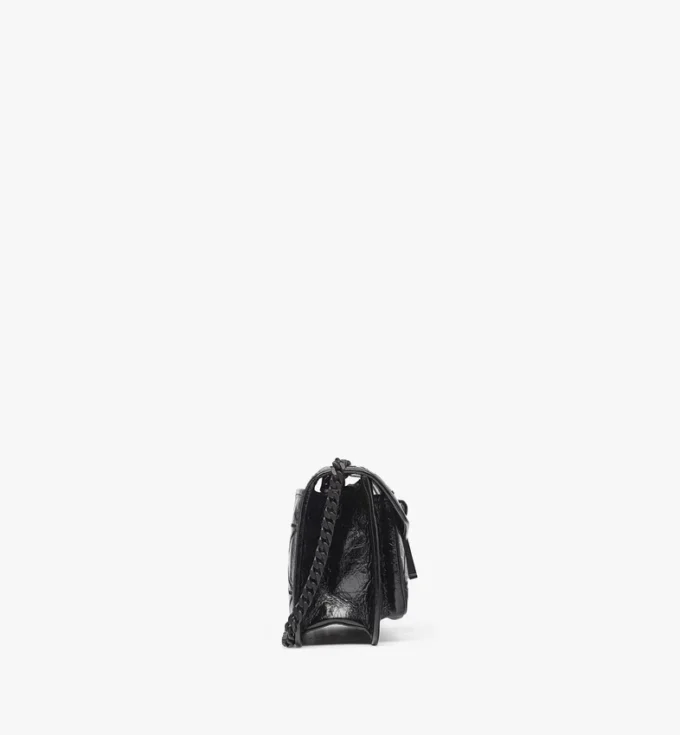 Sac à bandoulière matelassé Travia en cuir froissé Sac à bandoulière matelassé Travia en cuir froissé