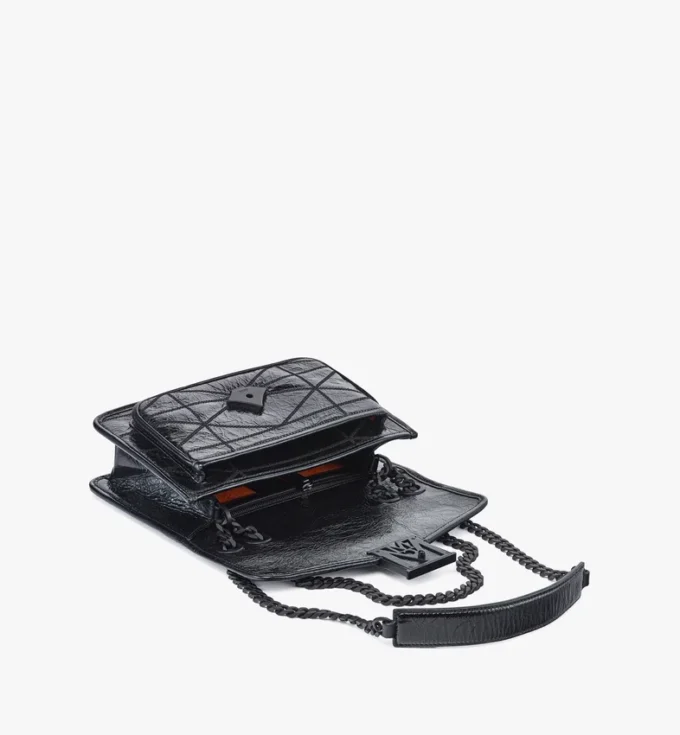 Sac à bandoulière matelassé Travia en cuir froissé Sac à bandoulière matelassé Travia en cuir froissé