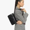 Sac à bandoulière matelassé Travia en cuir froissé Sac à bandoulière matelassé Travia en cuir froissé