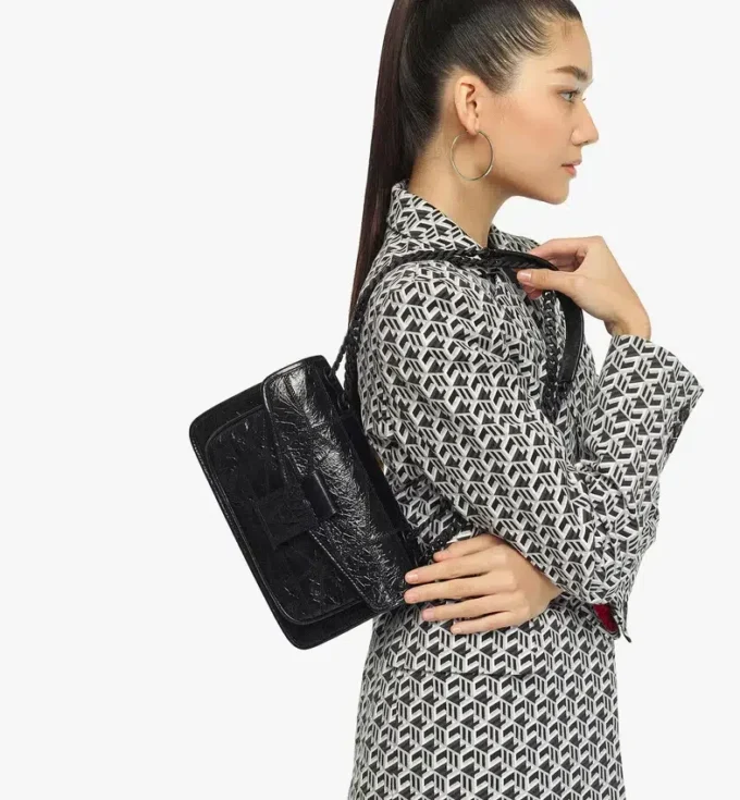 Sac à bandoulière matelassé Travia en cuir froissé Sac à bandoulière matelassé Travia en cuir froissé