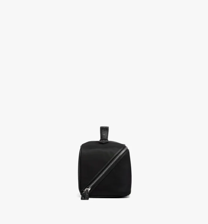 Trousses de toilette Ottomar en Econyl® et cuir